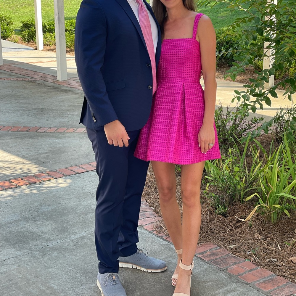 Alexis hot pink Arie dress.